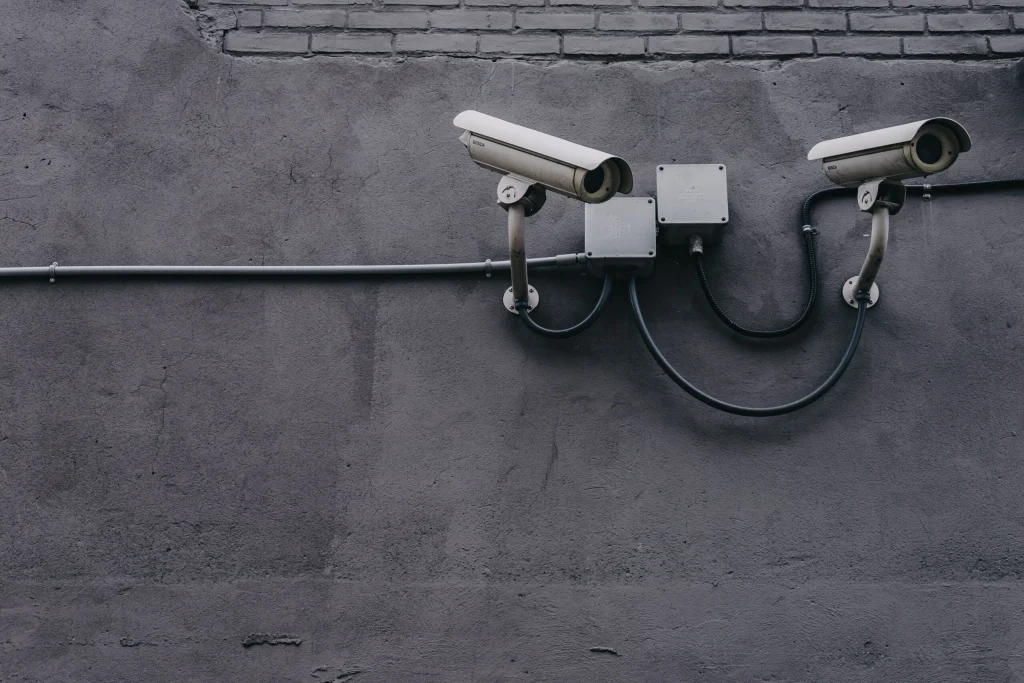 Security cameras mounted on a wall